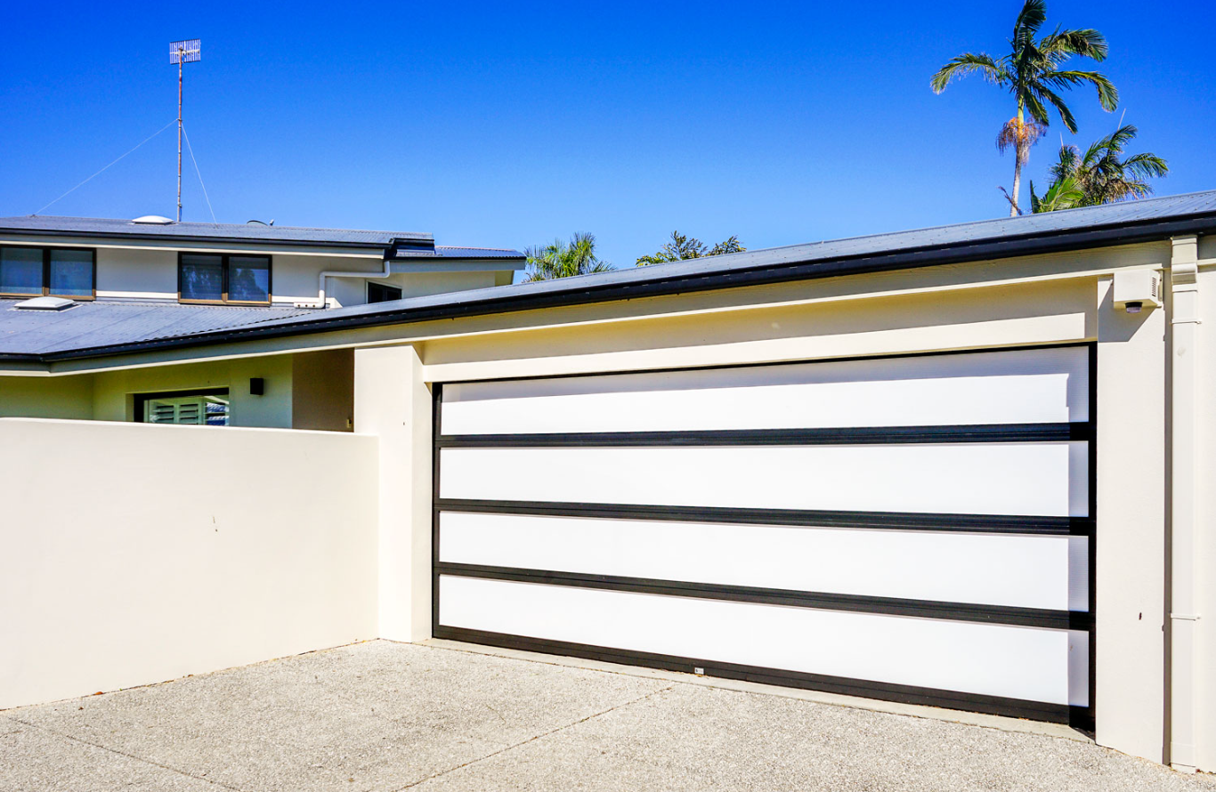 Custom garage door with a modern aluminum design for enhanced security and style"