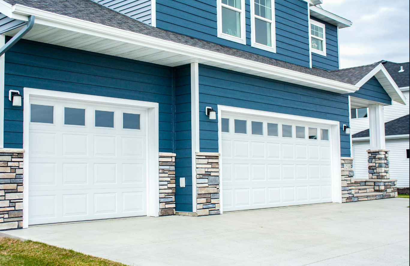 Technician repairing a garage door showcasing expertise in Local Garage Door Repair services