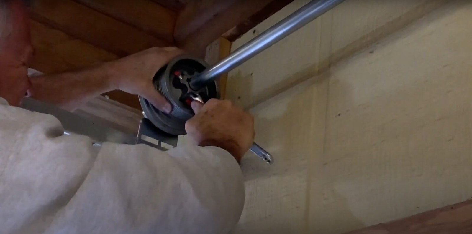 Garage Door Cable Repair service in Foxleigh showing expert adjustments for a frayed cable.