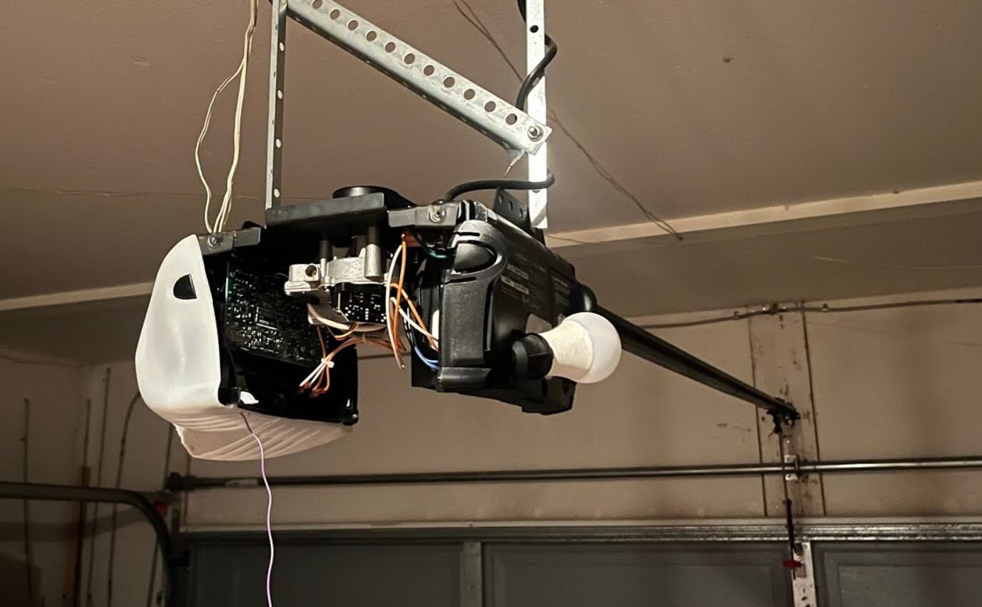 Professional technician performing garage door opener repair in Foxleigh for reliable service and maintenance.