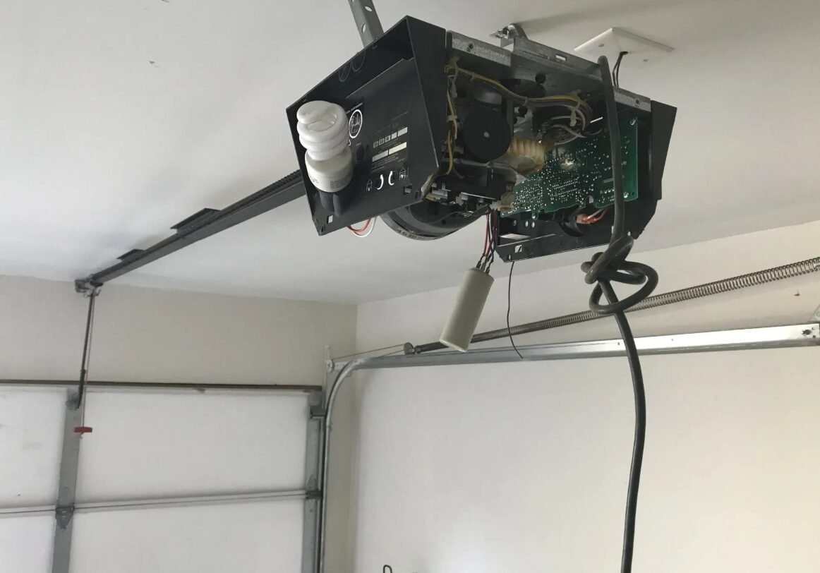 Experienced technician providing expert garage door opener repair service at Garage Door Repair Foxleigh LLC, ensuring smooth and reliable operation of your garage door system.