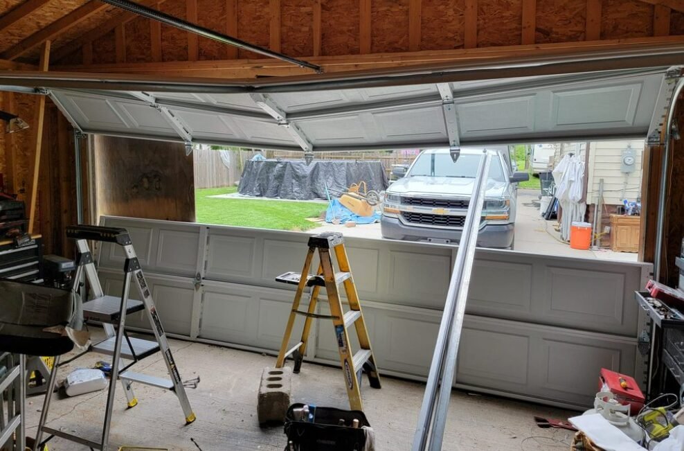 Expert technician performing garage door repair service in Foxleigh, ensuring smooth and safe operation.